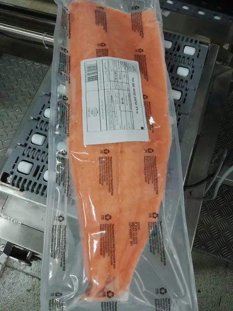 Vacuum-packed Chilean Atlantic salmon fillet prepared for a customer program